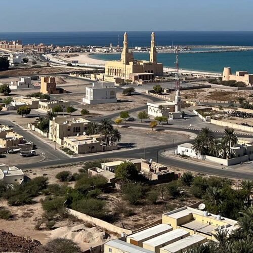Aerial view of the town of Bukha, its mosque and the sea
