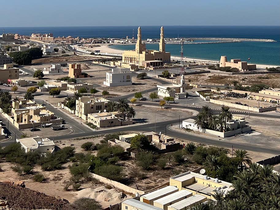 Aerial view of the town of Bukha, its mosque and the sea