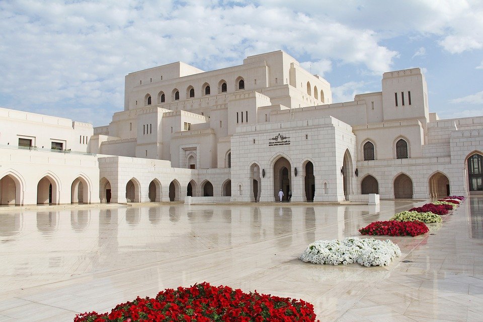 Royal Opera House Muscat with flower beds in front